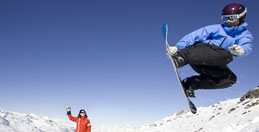 Alpine skiing or snowboarding